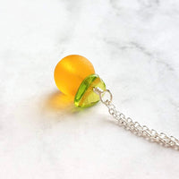 Orange Necklace, small fruit pendant, green leaf charm, orange jewelry, glass orange, translucent orange, Florida fruit, simple gold chain - Constant Baubling