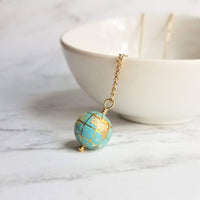 World Traveler with Turquoise Pendant