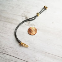 Gold Feather Bracelet, grey cord bracelet, gray gold bracelet, thin bracelet, stacking bracelet, twisted bracelet, minimalist, simple charm - Constant Baubling
