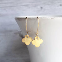 Gold Clover Earrings - small brushed 4 lobe leaf good luck charm dangle on simple latching kidney ear hook - St Patricks Day gift - Constant Baubling