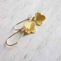 Gold Clover Earrings - small brushed 4 lobe leaf good luck charm dangle on simple latching kidney ear hook - St Patricks Day gift - Constant Baubling