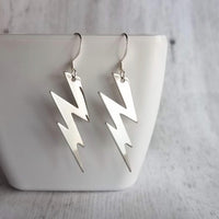 Lightning Bolt Earring - silver or gold SHAZAM charm, high voltage storm weather dangle on simple ear hooks, long jagged zig zag shape - Constant Baubling