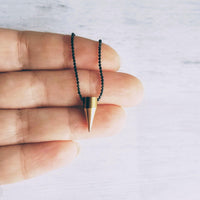 Gold Spike Necklace, solid brass bullet point pendant, gold dagger necklace, black chain necklace, black gold necklace, gold bullet necklace - Constant Baubling