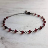 Garnet Bracelet , January birthstone bracelet, garnet jewelry, gunmetal bracelet, tiny garnet stones, delicate stone bracelet, red gemstone - Constant Baubling