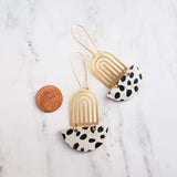 Large Leopard Print Earrings - gold brass rainbow arches w/ black white pony cow spots, long latching kidney ear hooks, 3 inch, cork leather - Constant Baubling