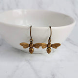 Little Bee Earrings, small antique brass bee earring, bumblebee earring, flying bee earring, bronze honey bee earring, bee dangle earring - Constant Baubling