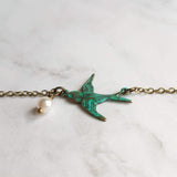 Little Bird Necklace, verdigris patina, antique brass chain, bronze necklace, blue green patina, flying bird necklace, pearl necklace, small - Constant Baubling
