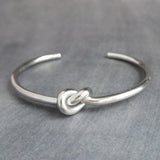 Silver Knot Bracelet - tie the knot bracelet, bridesmaid bracelet, pretzel knot, knot cuff, silver cuff bracelet, thin cuff, oval bangle - Constant Baubling