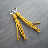 Long Tassel Earrings, faux suede tassel, goldenrod vegan leather tassel, harvest gold, mustard yellow, silver huggie hoop, round lever back - Constant Baubling