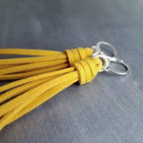 Long Tassel Earrings, faux suede tassel, goldenrod vegan leather tassel, harvest gold, mustard yellow, silver huggie hoop, round lever back - Constant Baubling