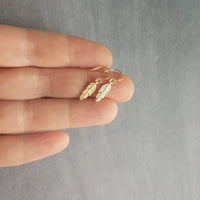 Tiny Gold Feather Earrings, small feather earring, tiny feather earring, gold feather charm, little feather dangle, simple gold feather - Constant Baubling